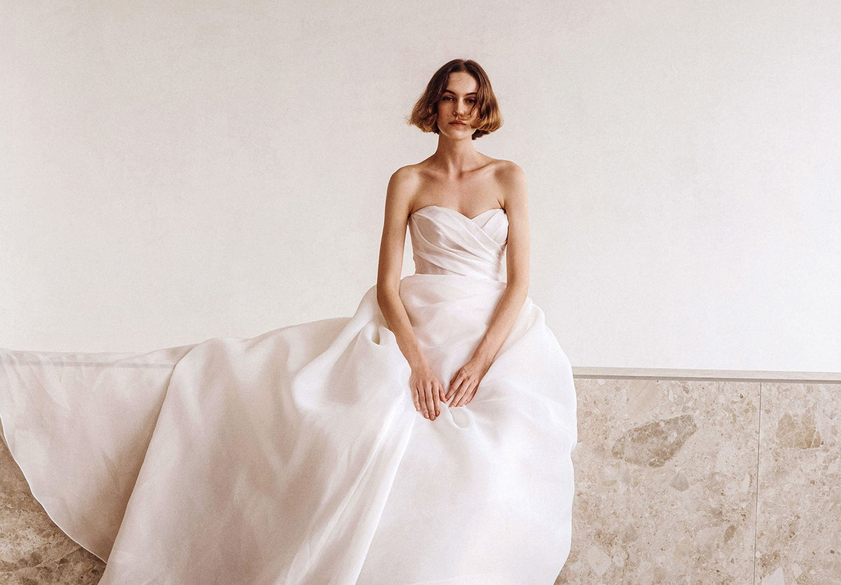 Elegant La Premiere Bridal dress modelled at the New York bridal market, featuring timeless couture design.